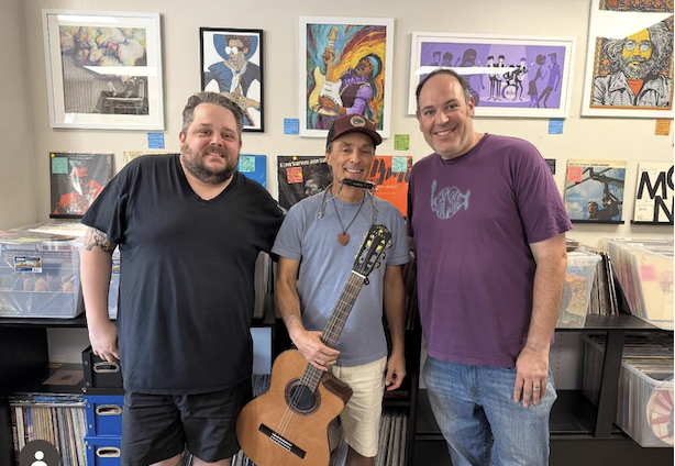 A visit in the shop, including a guitar and harmonica