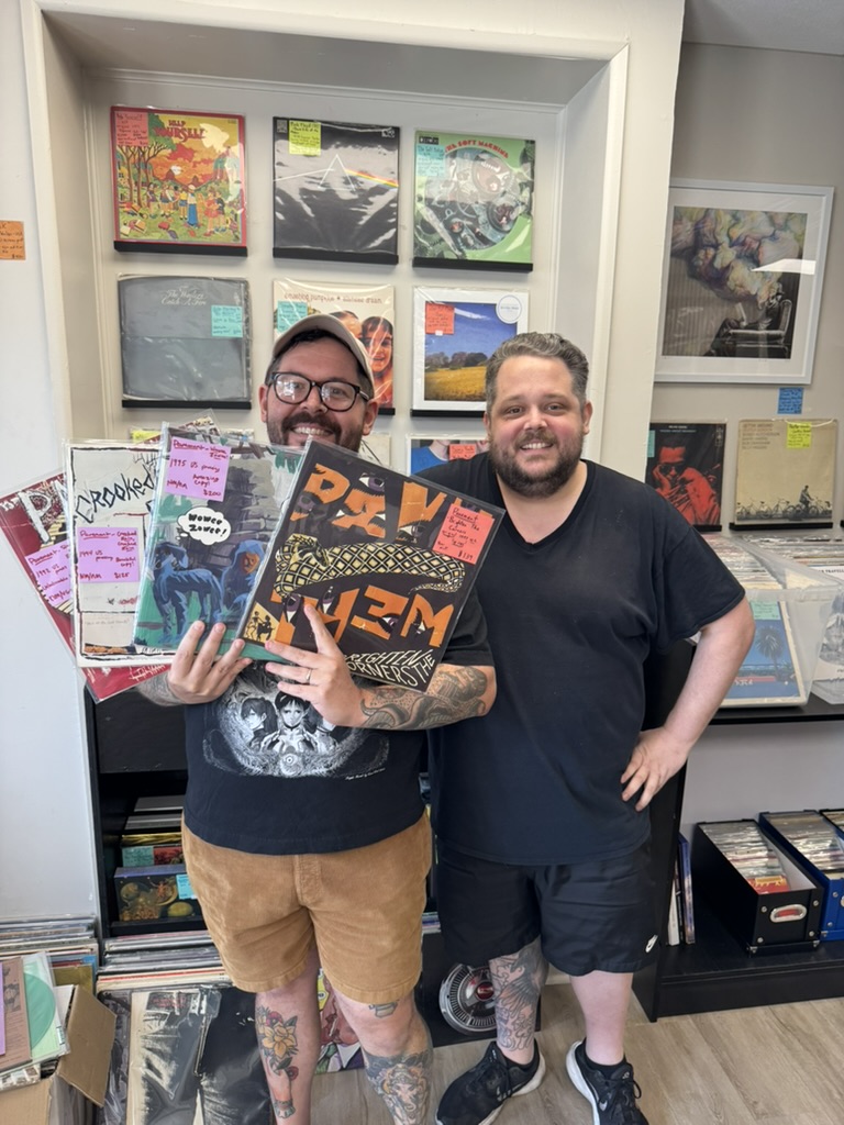 Customers in the shop with Pavement records